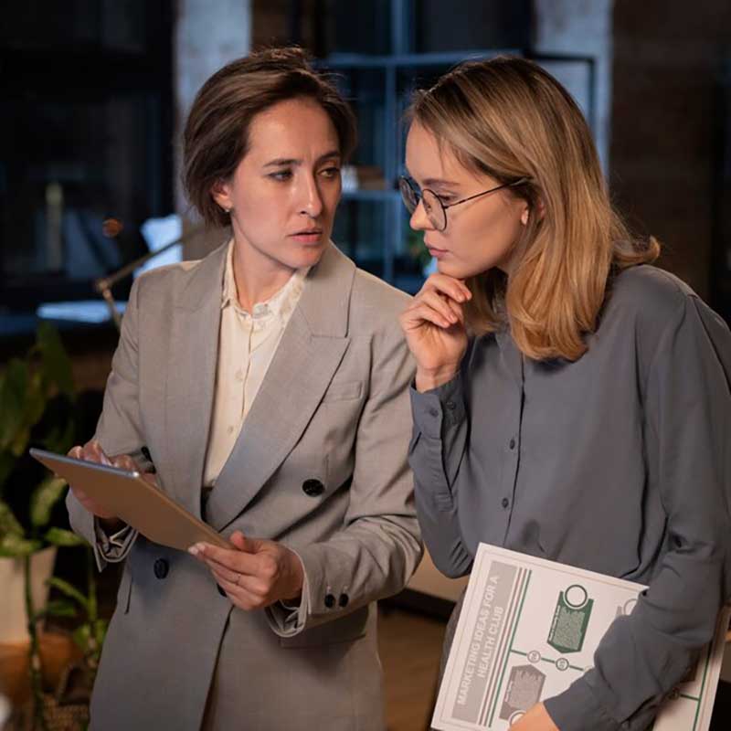 planning discussion between website developer and client